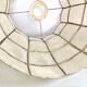 Mother-of-pearl and brass suspension