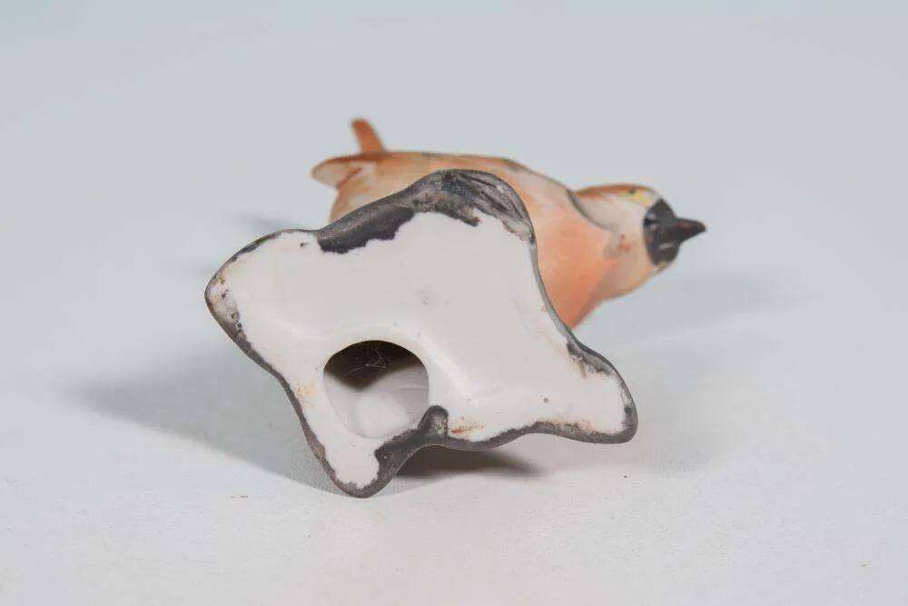 Vintage porcelain bird statuette from the sixties.