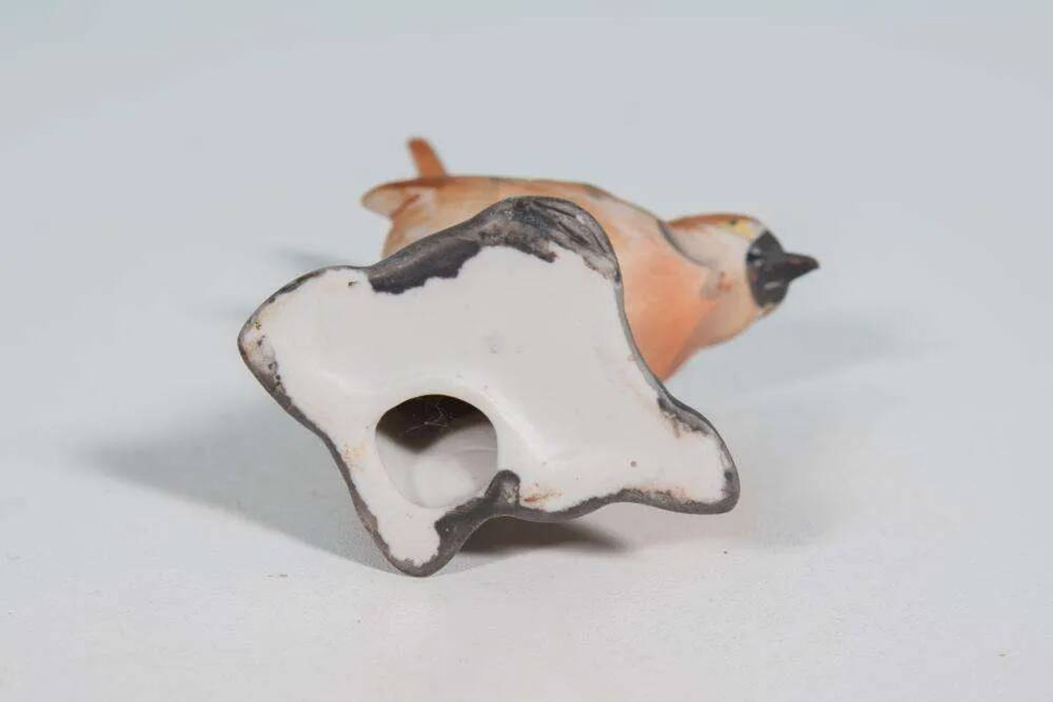Vintage porcelain bird statuette from the sixties.