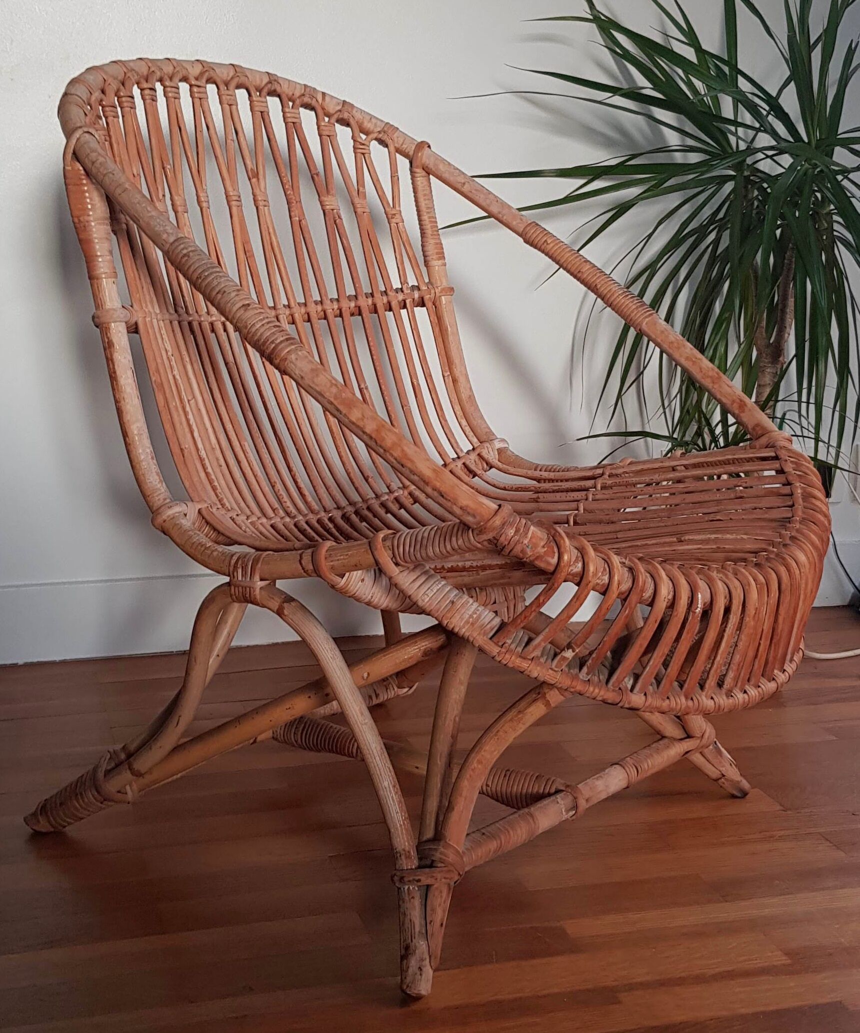 Vintage rattan armchair original shell shape
