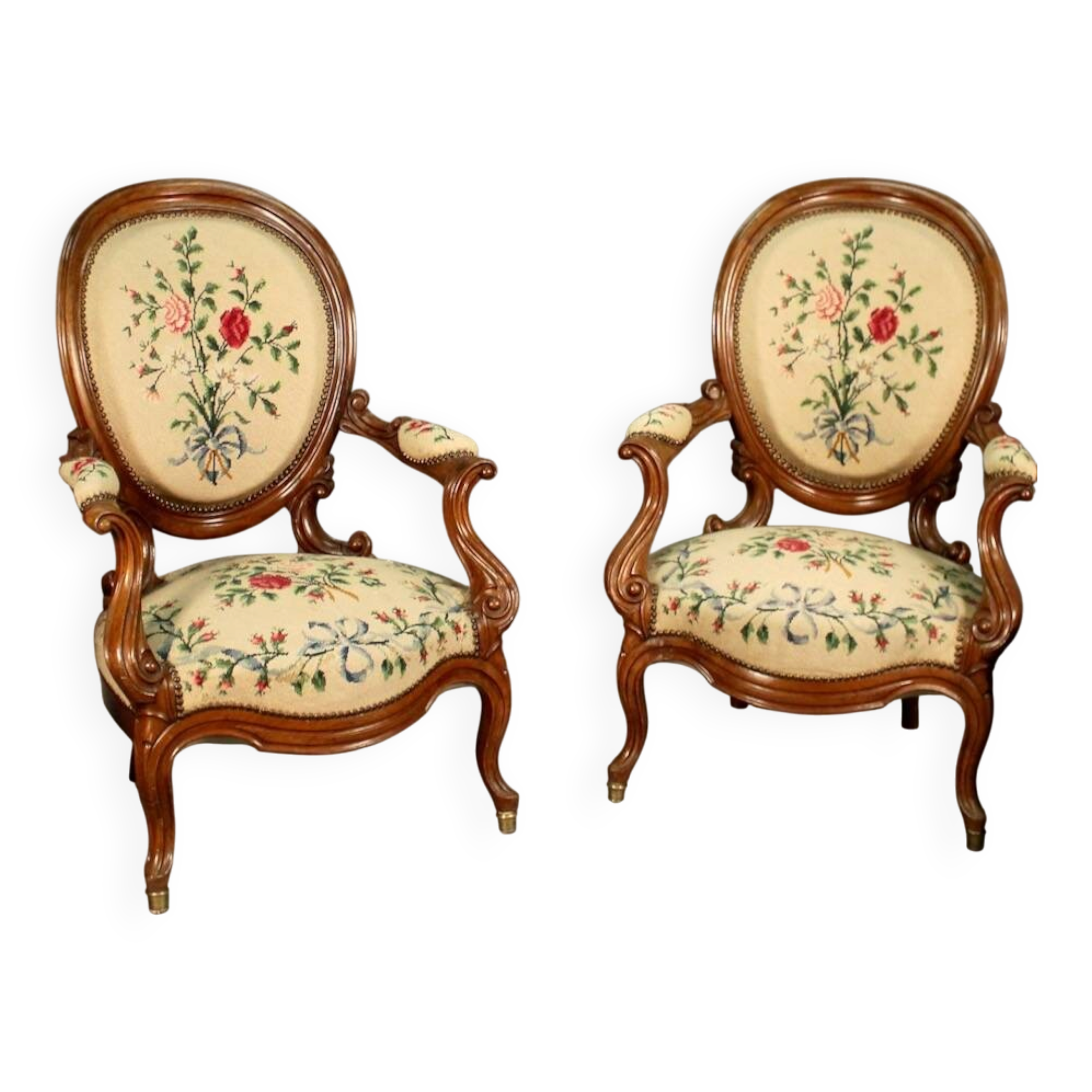 Pair of Louis Philippe armchairs with petit point upholstery.