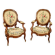 Pair of Louis Philippe armchairs with petit point upholstery.