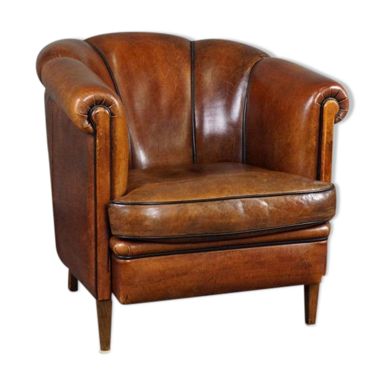 Club armchair in warm coloured sheepskin
