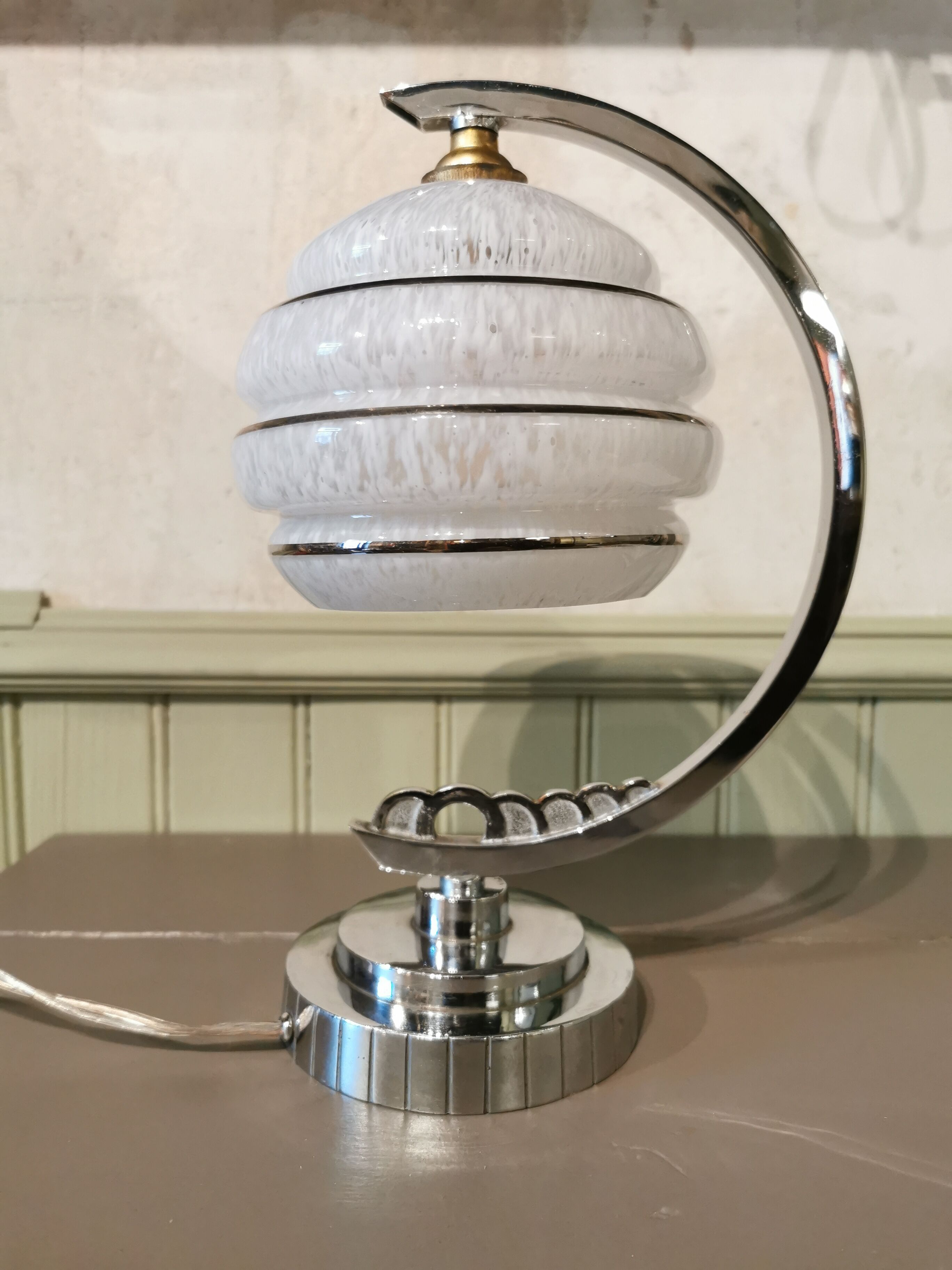 Half-moon chrome art deco lamp