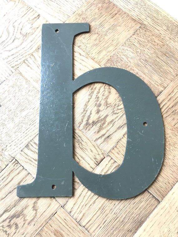 Vintage metal industrial letter D