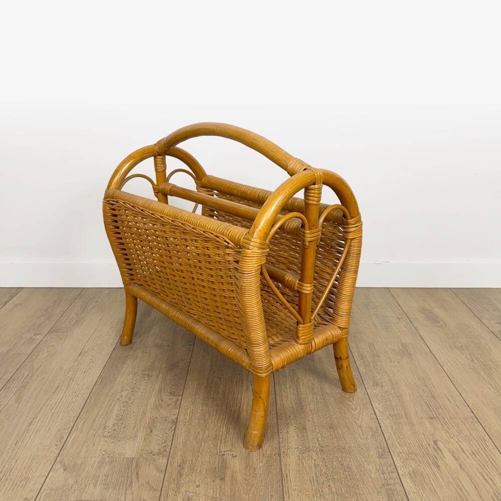 Vintage caramel-colored bamboo and rattan magazine rack