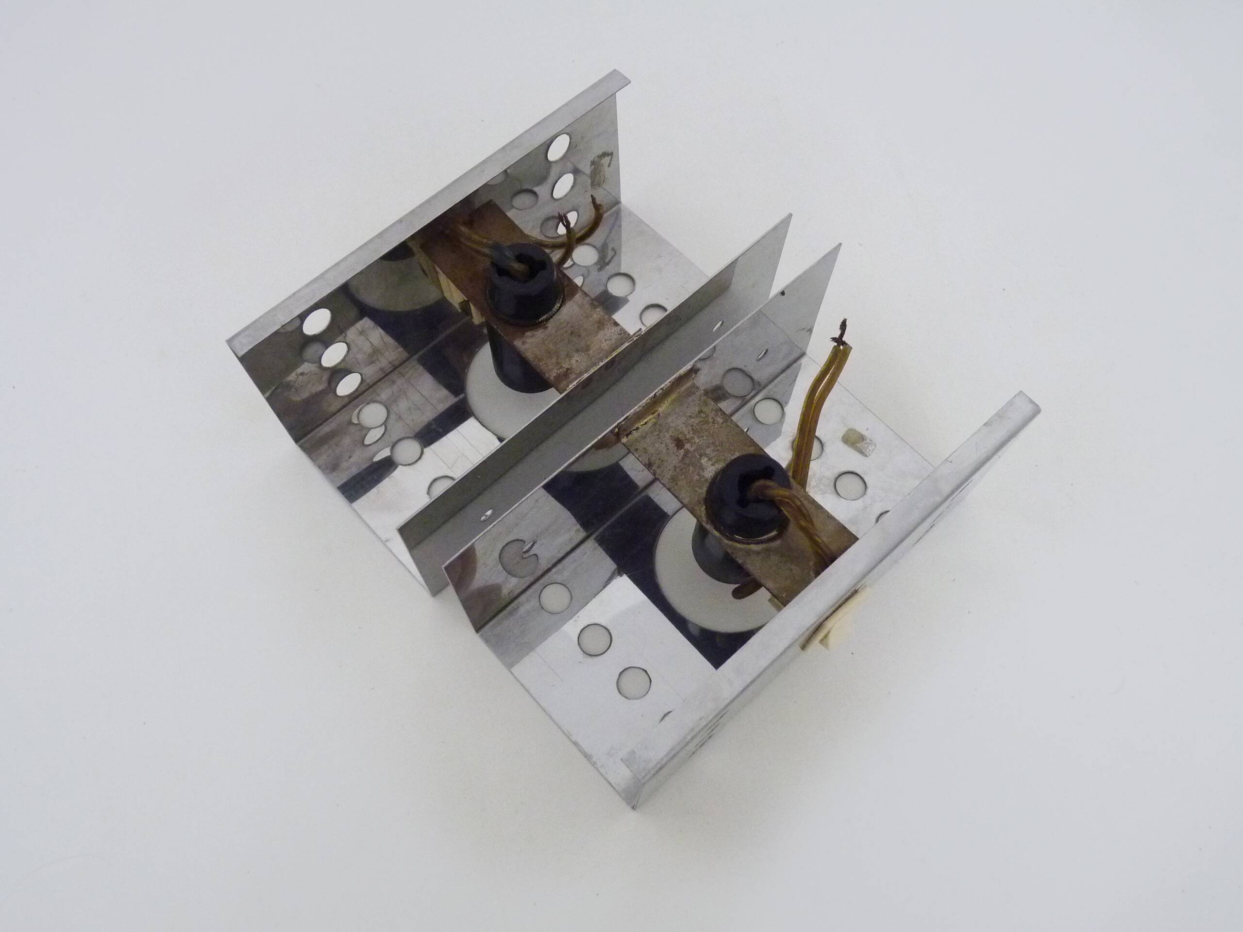 Pair of vintage chrome stainless steel wall sconces. Space Age