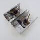 Pair of vintage chrome stainless steel wall sconces. Space Age