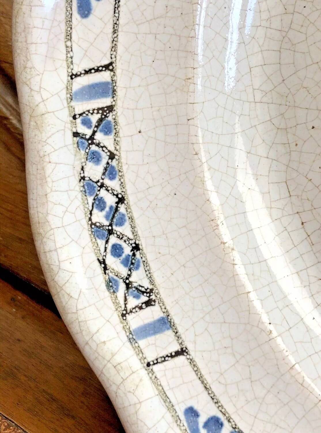 Old round hollow dish XVIII black bottom Rouen Forges les eaux