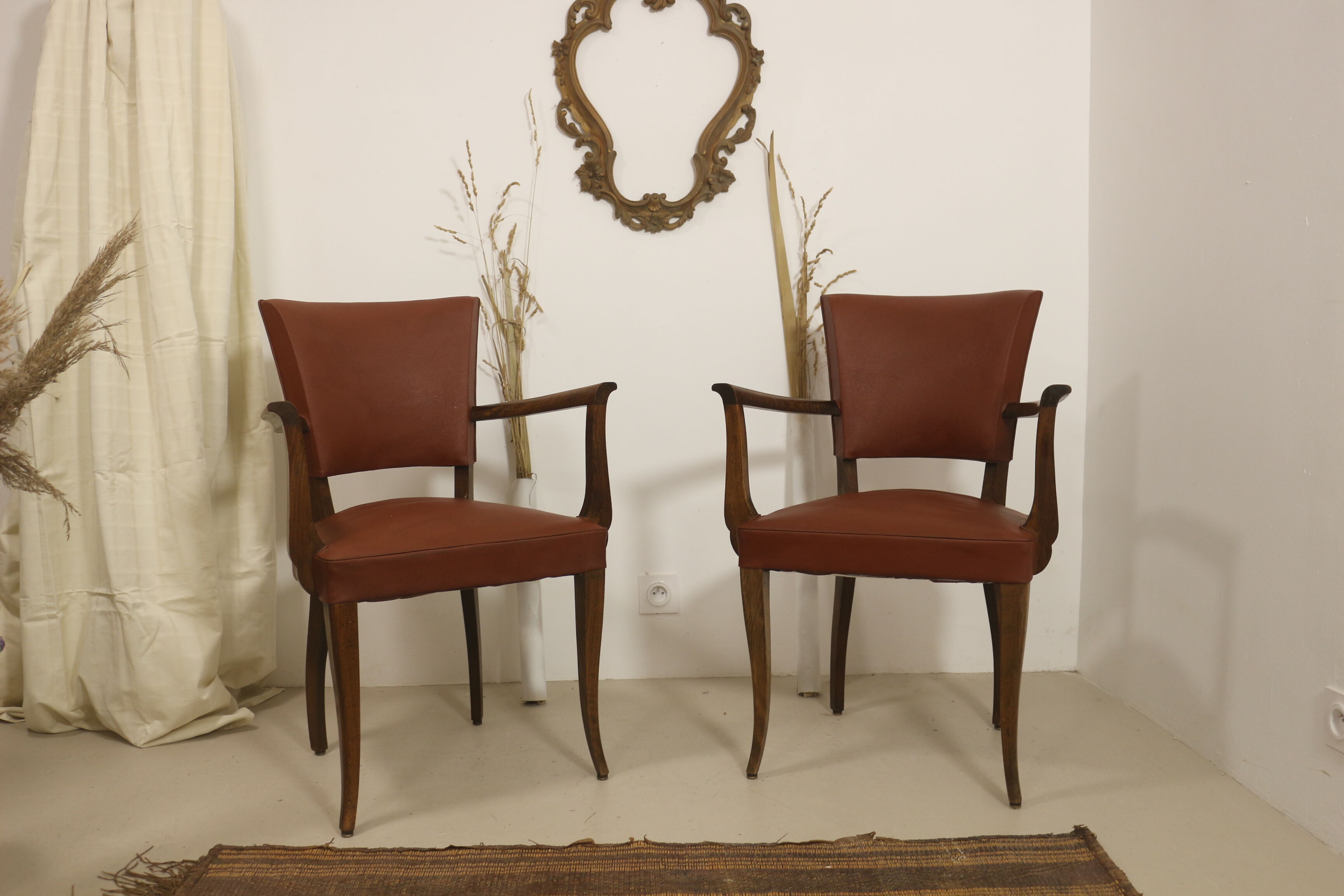 Pair of vintage bridge armchairs year 60 in imitation rust leather.