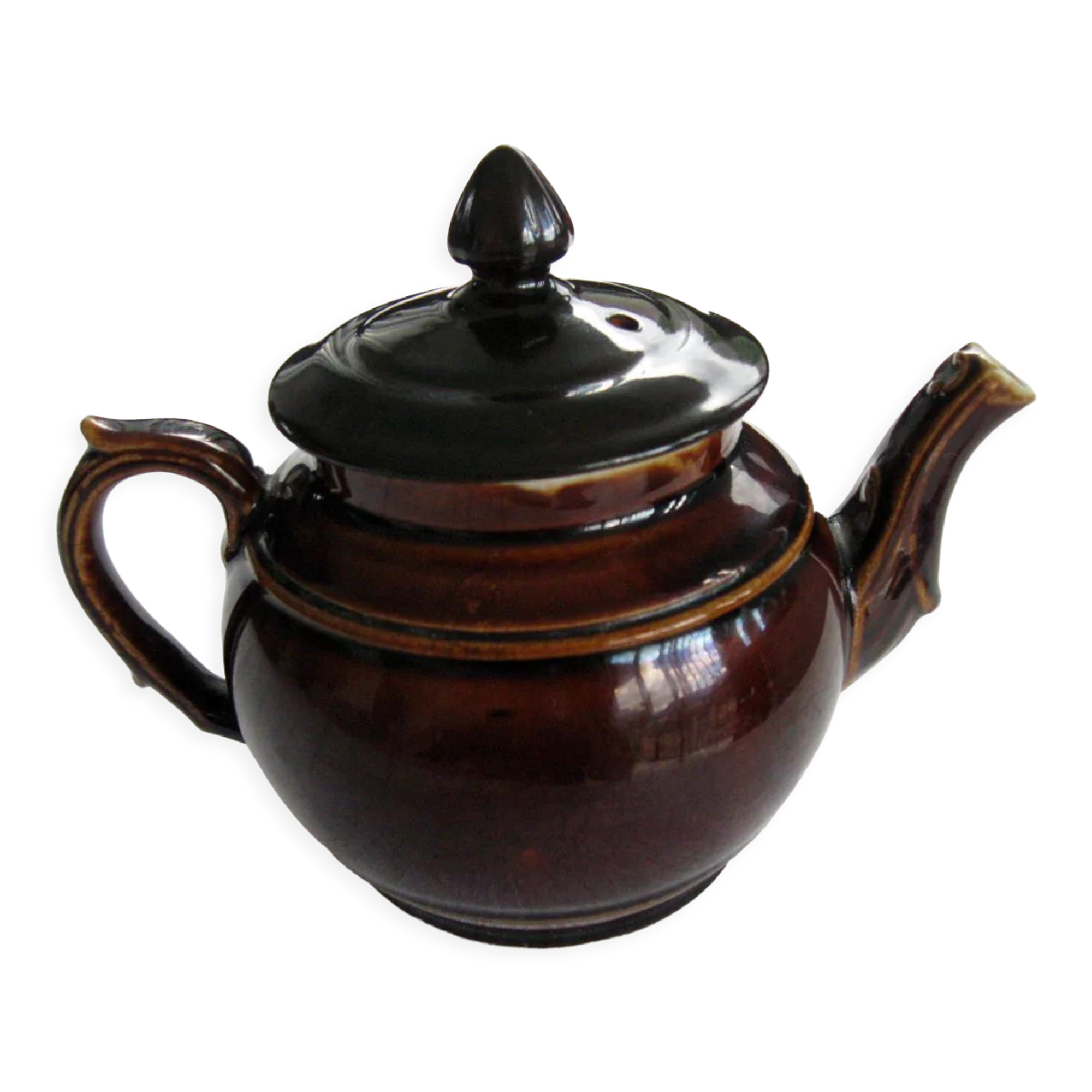 Old brown glazed ceramic coffee pot