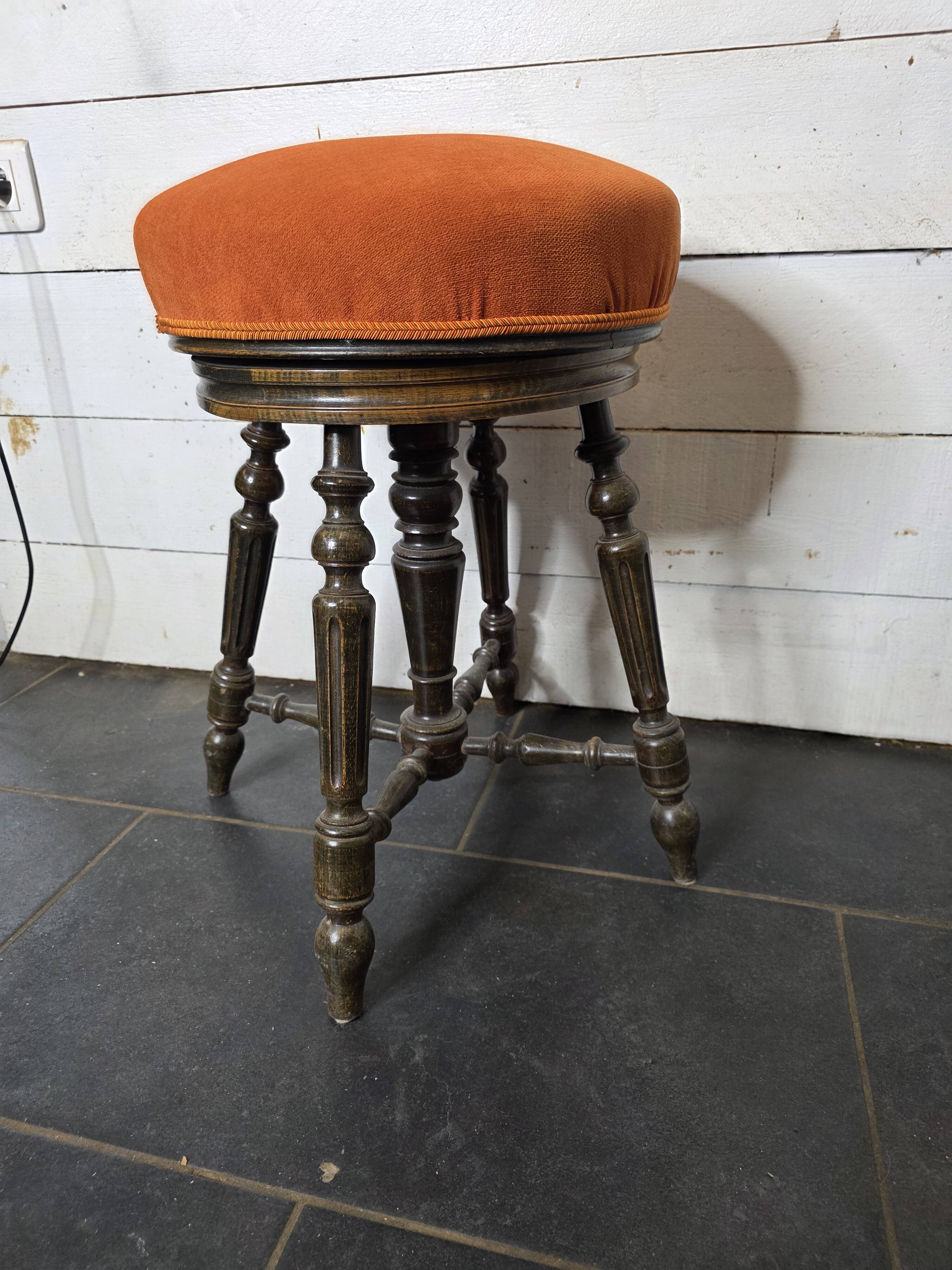 Antique adjustable piano stool