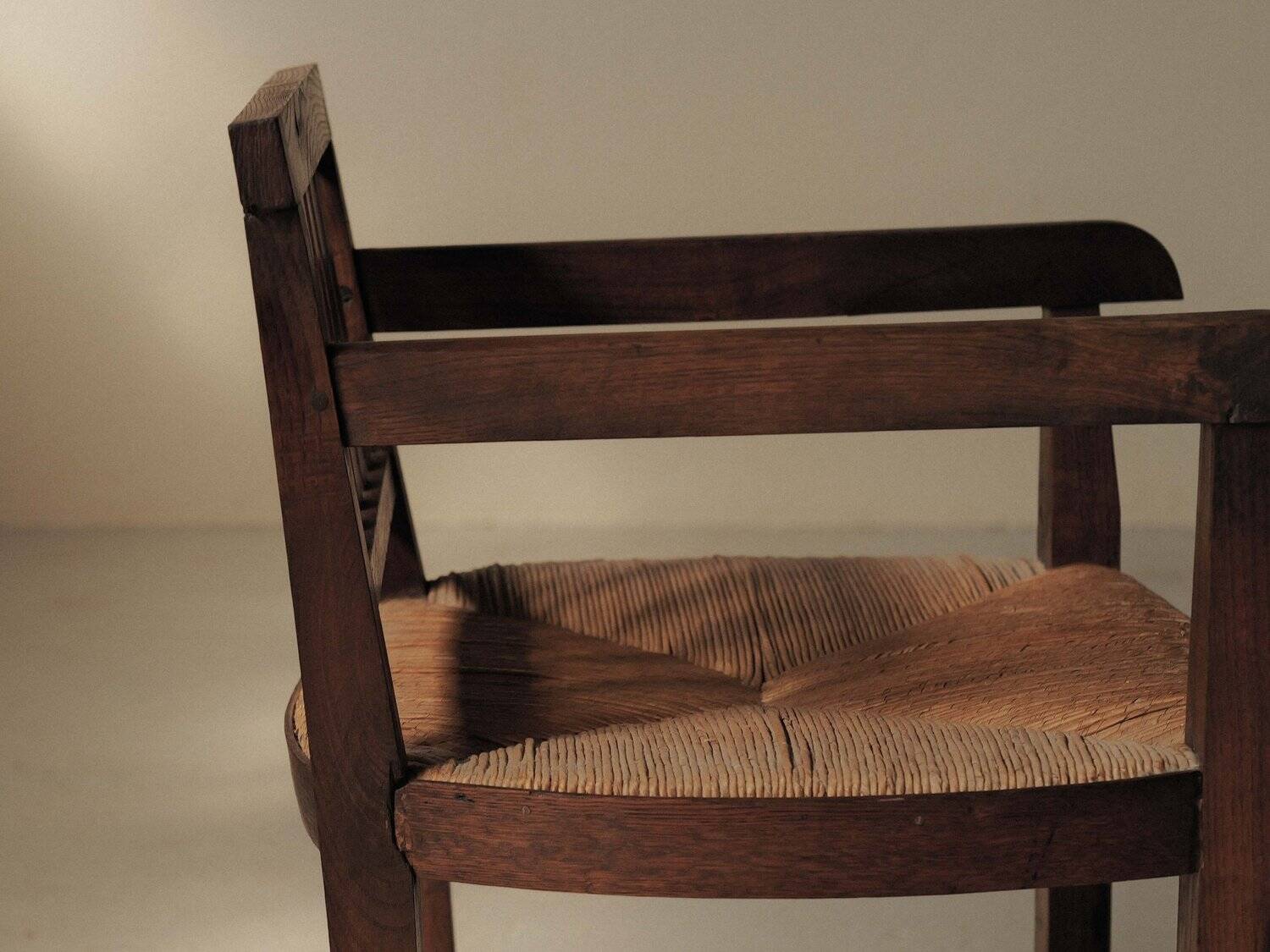 Handcrafted oak and straw armchair, France, circa 1950.