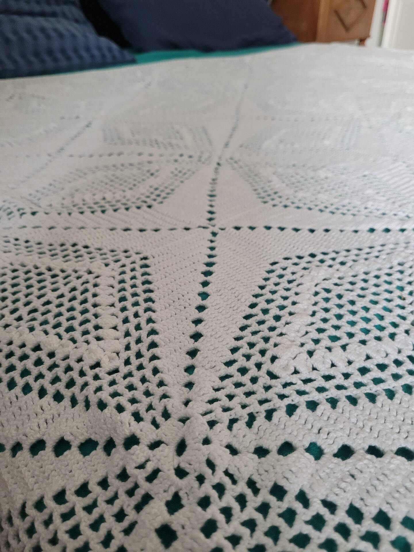 Large white crocheted bedspread