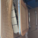 Plia chairs by Castelli in wood and cane.