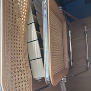 Plia chairs by Castelli in wood and cane.