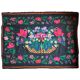 Romanian black wool carpet with a basket of colorful flowers