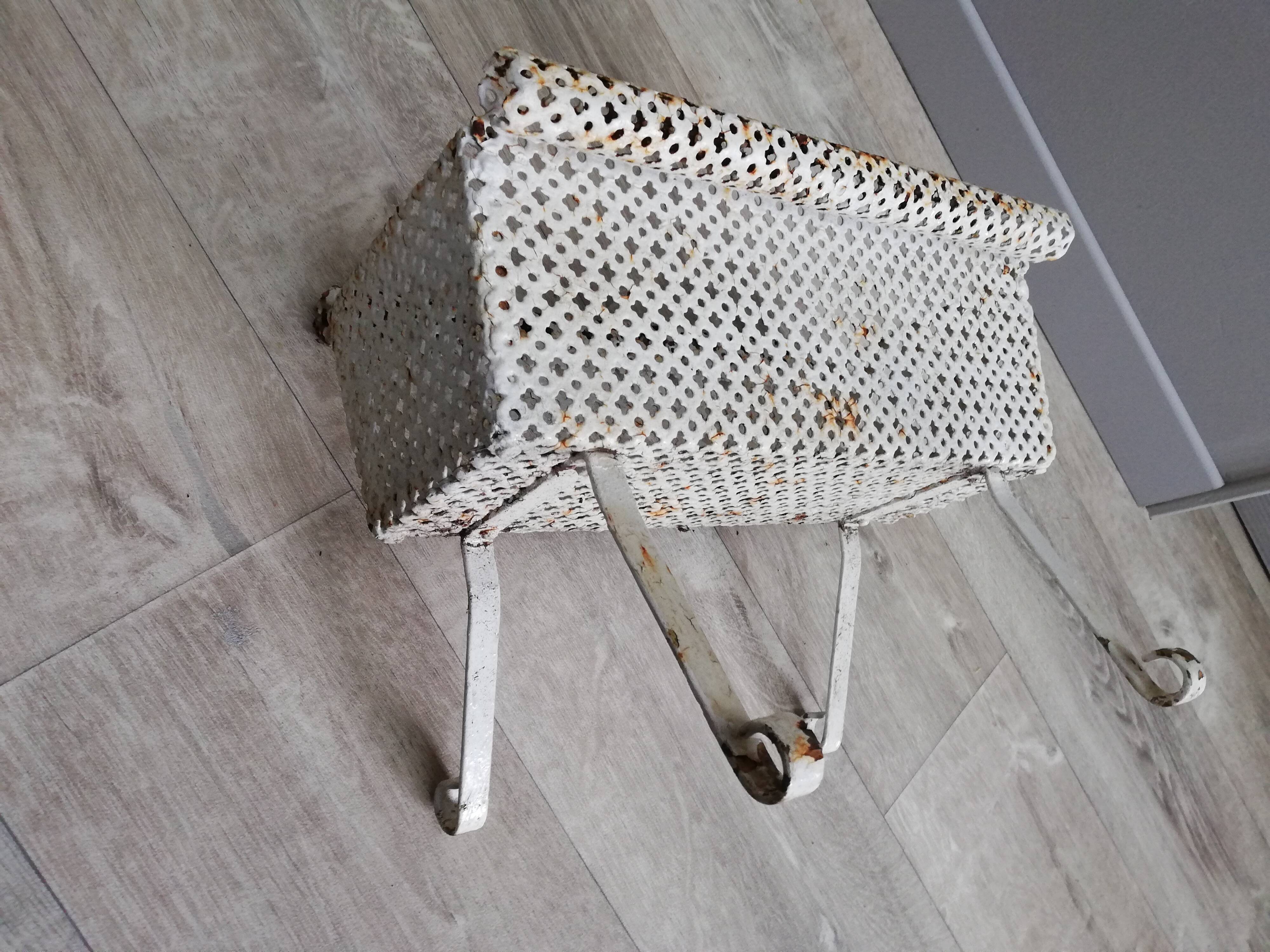 Wrought iron planter with pot cover perforated sheet metal