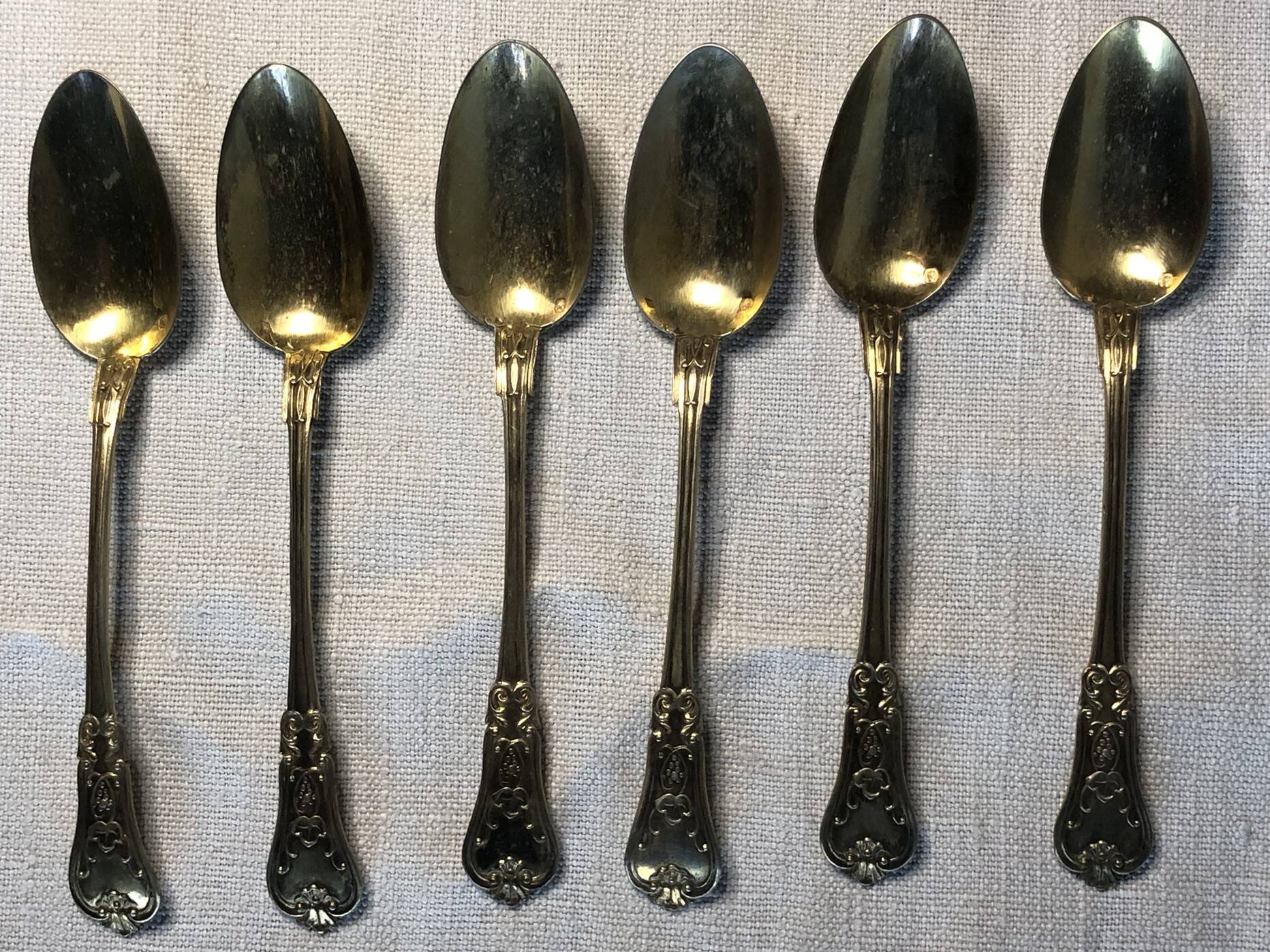 Vermeil (gilded silver) spoons in black wooden box