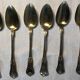 Vermeil (gilded silver) spoons in black wooden box