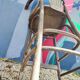 Curved wooden bar stool