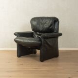 1980s cor armchair and ottoman in black leather