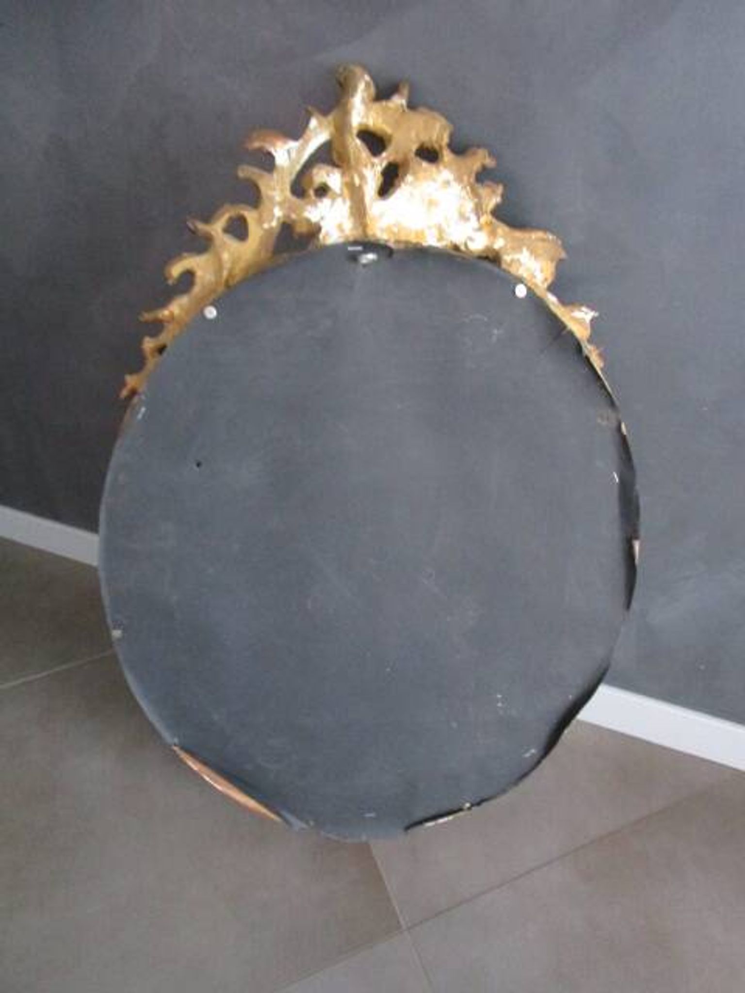 Antique mirror in wood and gilded stucco
