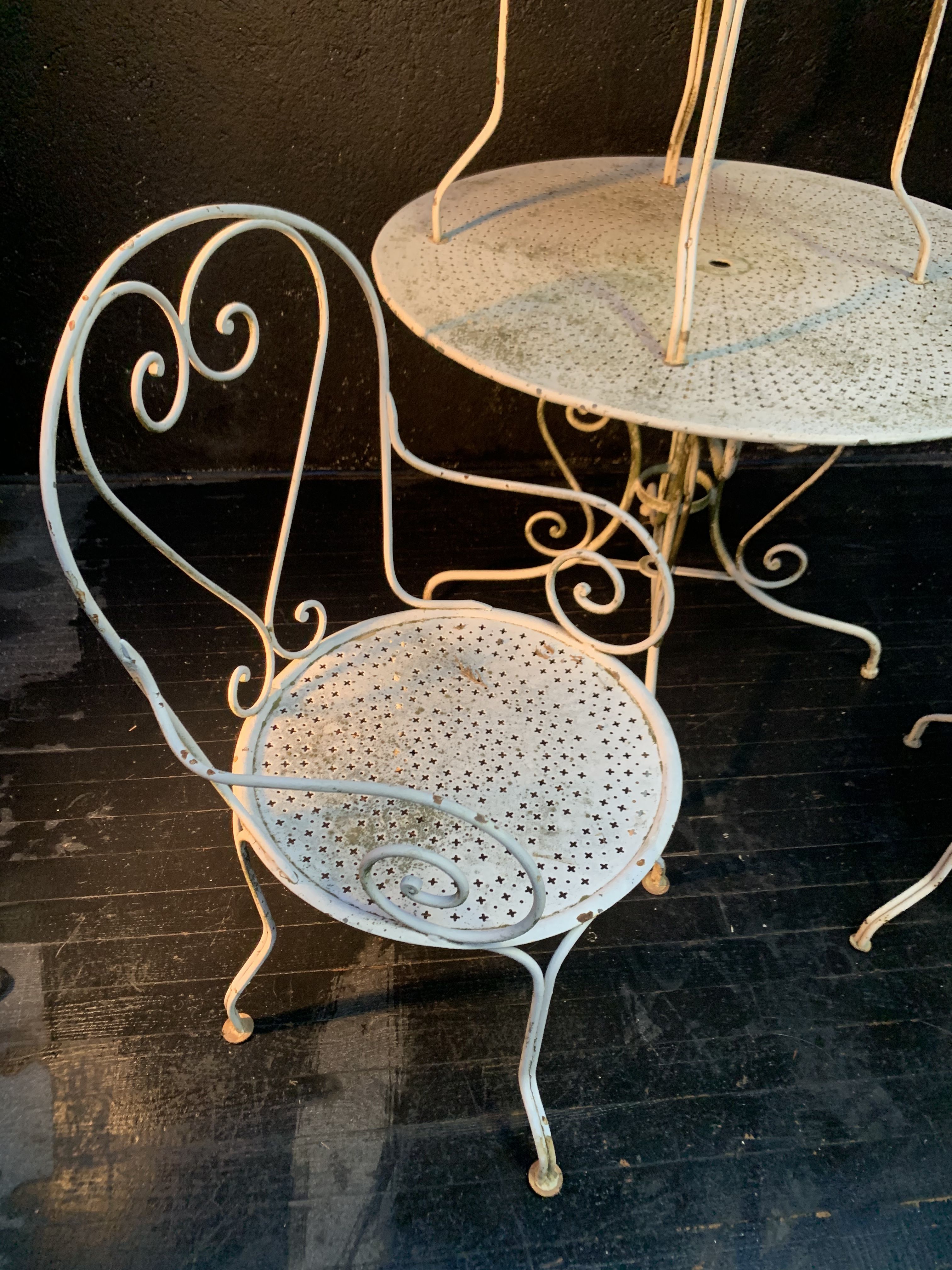 Set of wrought iron garden furniture