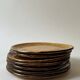 Set of glazed ceramic dessert plates