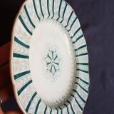 A plate made of earthenware decorated with flower crown