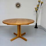 Antique round Scandinavian dining table from the 70s with 1 solid wood extension