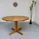 Antique round Scandinavian dining table from the 70s with 1 solid wood extension