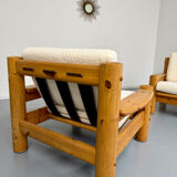 Set of 2 armchairs in solid pine with boucle fabric, 1970s Scandinavian design.