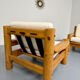 Set of 2 armchairs in solid pine with boucle fabric, 1970s Scandinavian design.