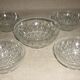 Lot salad bowl and 4 cups in pressed molded glass