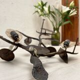 Wall lamp in wrought iron.