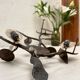 Wall lamp in wrought iron.