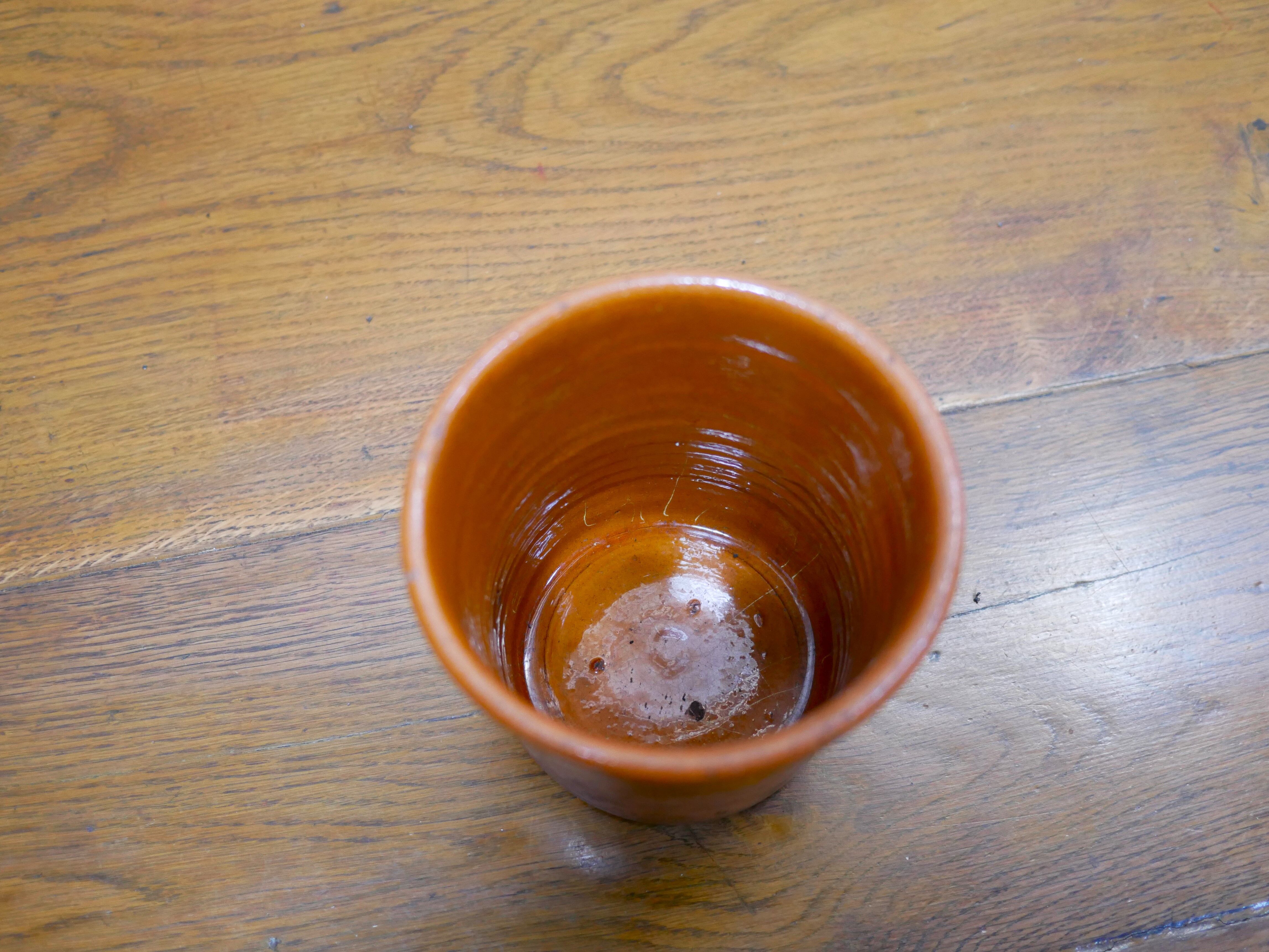 Vintage pot in glazed terracotta