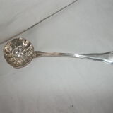 Powdered sugar spoon in silver metal