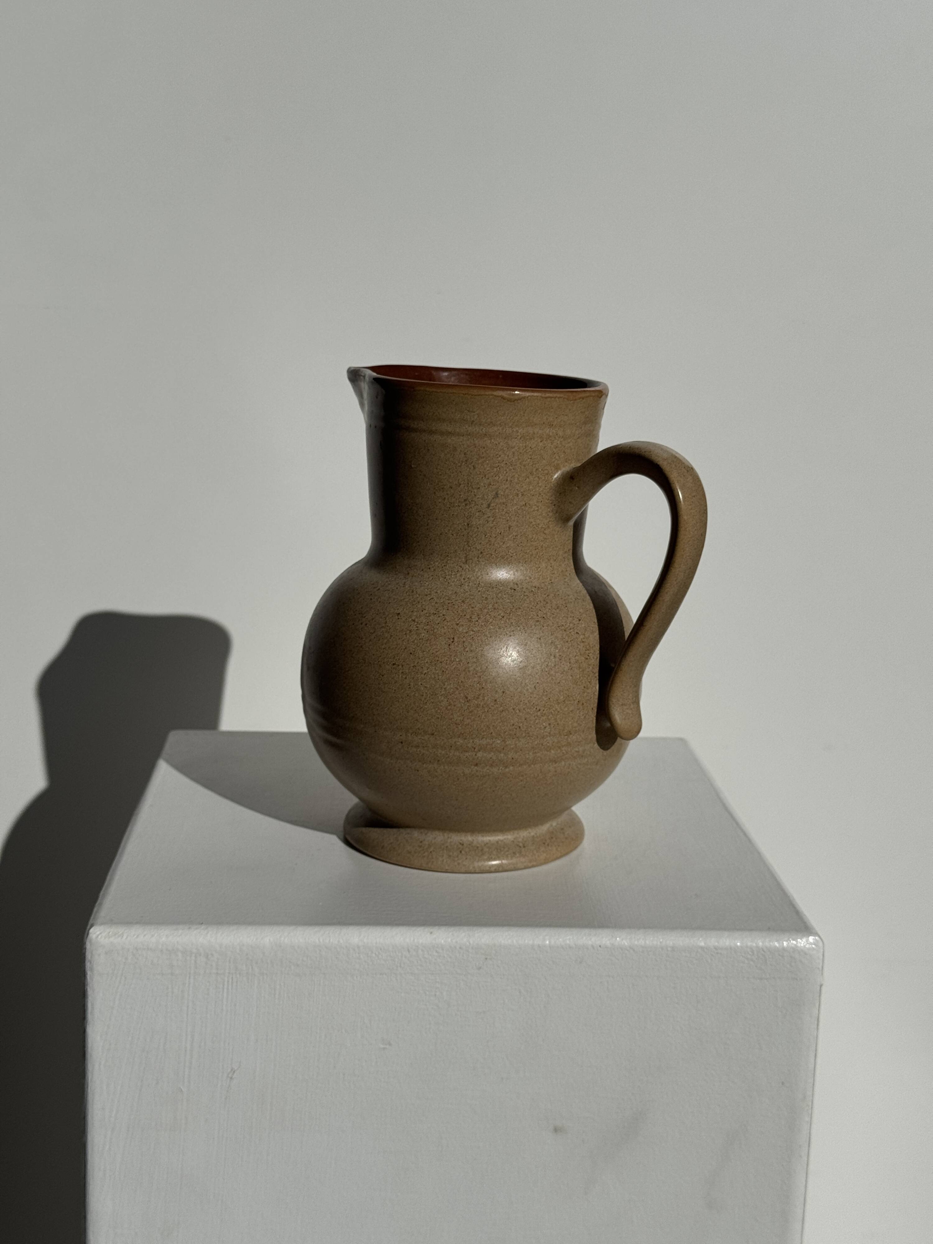 Vintage stoneware round carafe