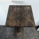 Fluted column side table in oak with a square top.