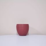 Brown bowl with a green and blue design