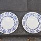 Pair of Castellania plates from Italy with blue fish decoration.