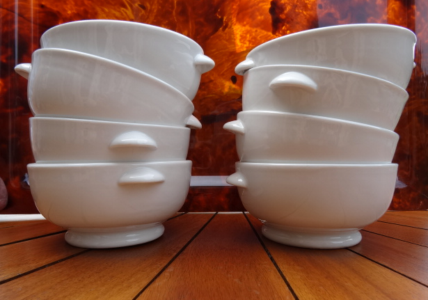 Lot of 8 ears to fire white porcelain bowls