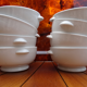 Lot of 8 ears to fire white porcelain bowls