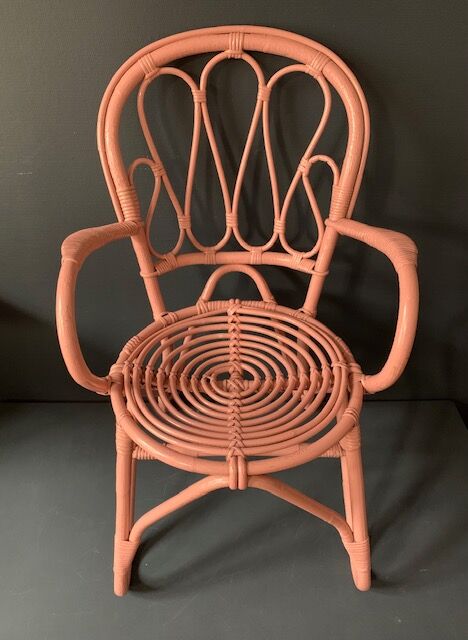 Vintage pink rattan armchair