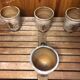 Set of 4 beige ceramic mugs fleur de lys vintage