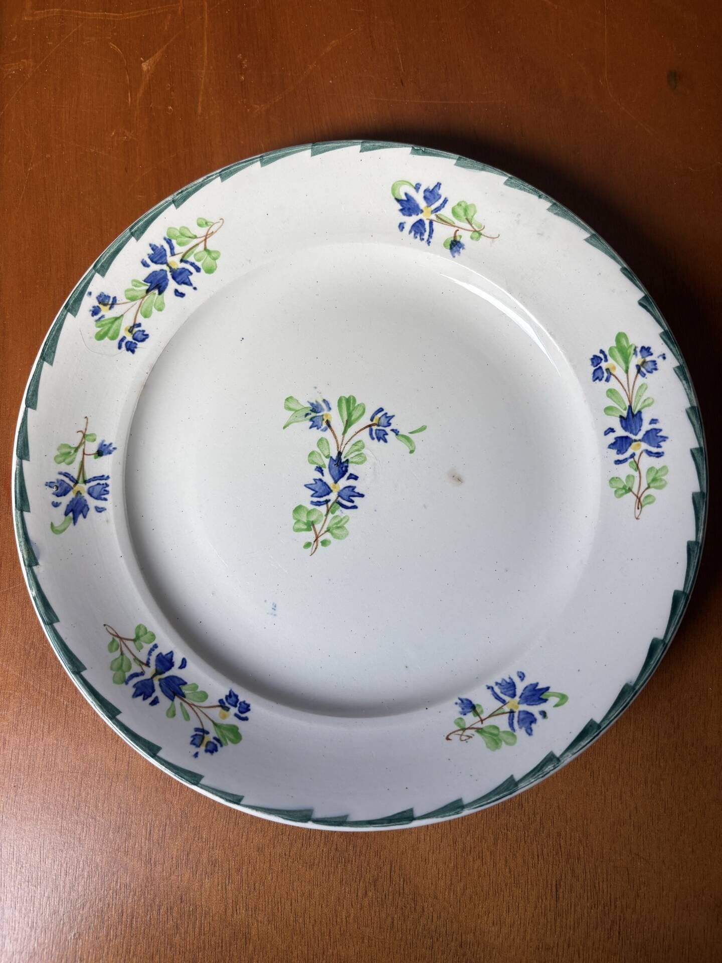 Set of 4 antique dessert plates, Terre de Fer floral pattern.