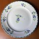Set of 4 antique dessert plates, Terre de Fer floral pattern.