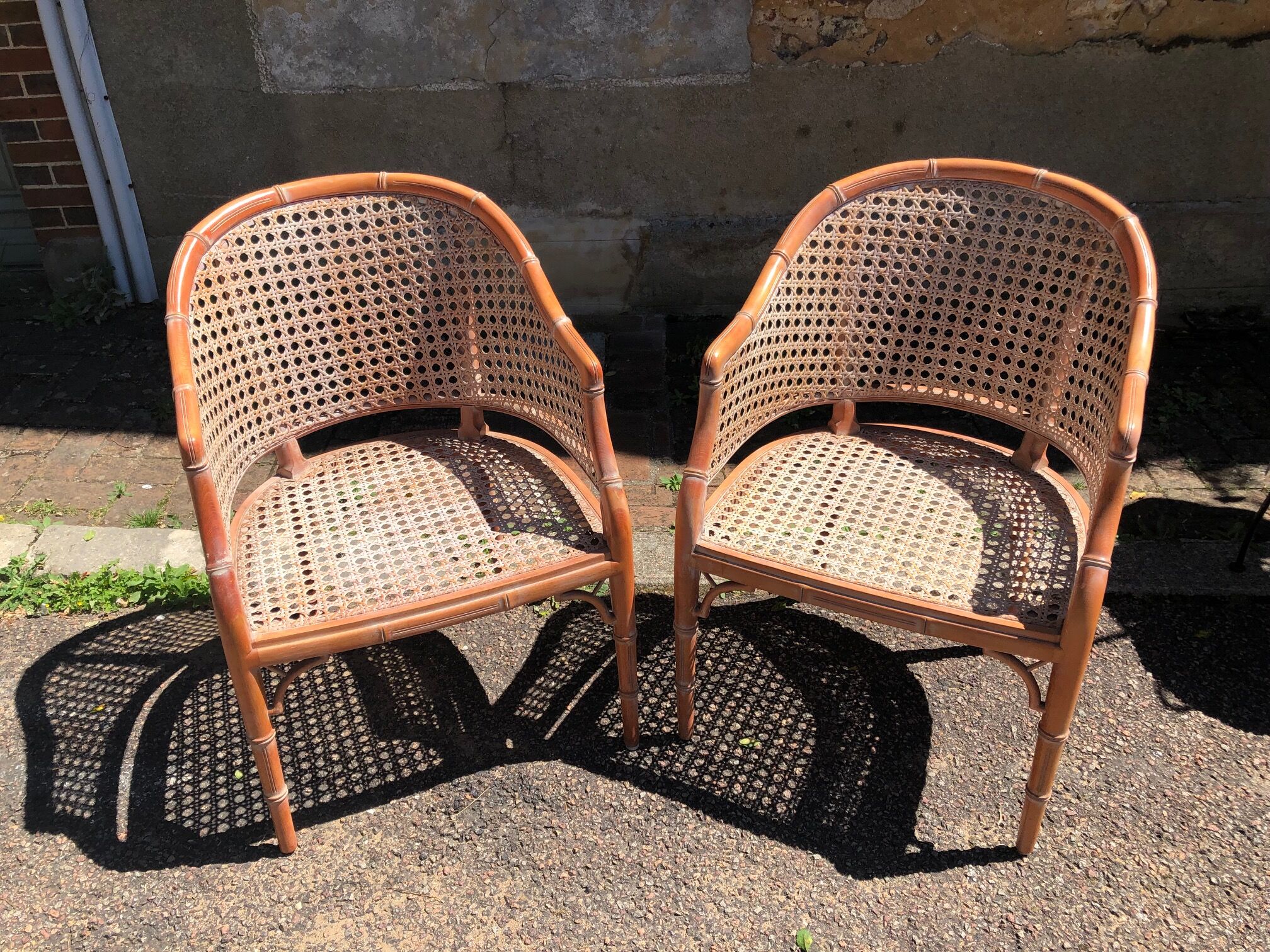 pair of gondola canned armchairs and their new cake